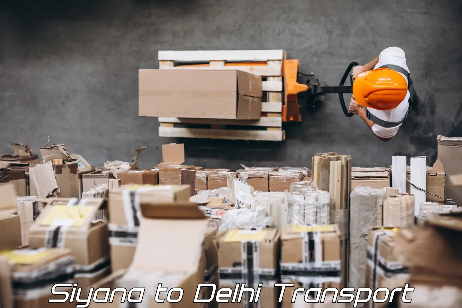 Parcel transport services in Siyana to Jamia Millia Islamia New Delhi