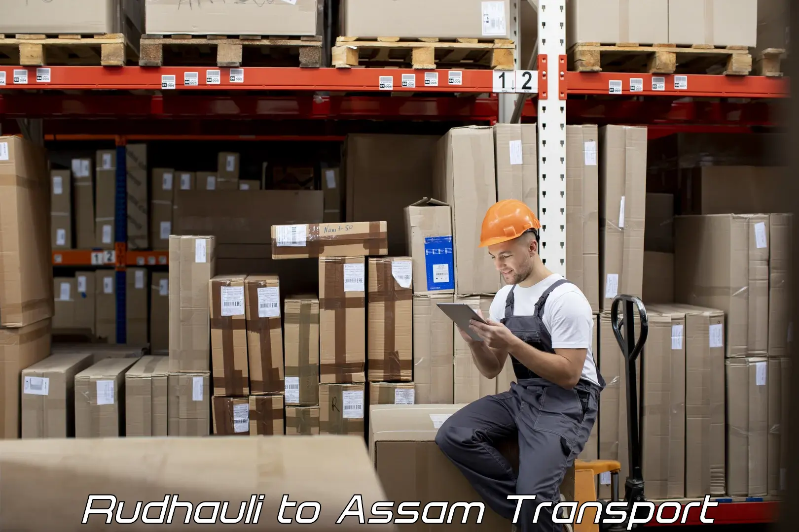 Two wheeler parcel service Rudhauli to Assam